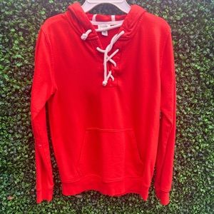 Orange woman’s J.Crew sweater